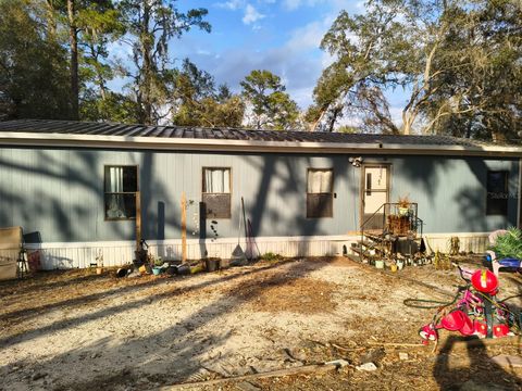 Photo of 16365 SE 57th Street, Ocklawaha, FL 32179 (MLS # OM718764)