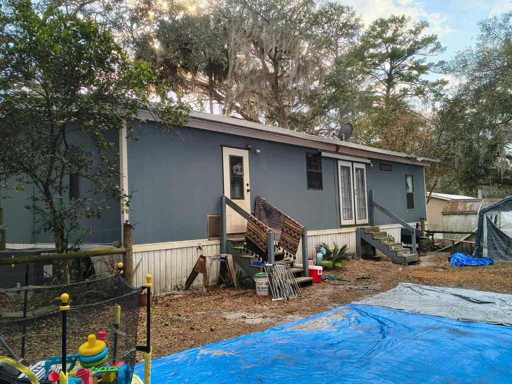 Photo of 16365 SE 57th Street, Ocklawaha, FL 32179 (MLS # OM718764)