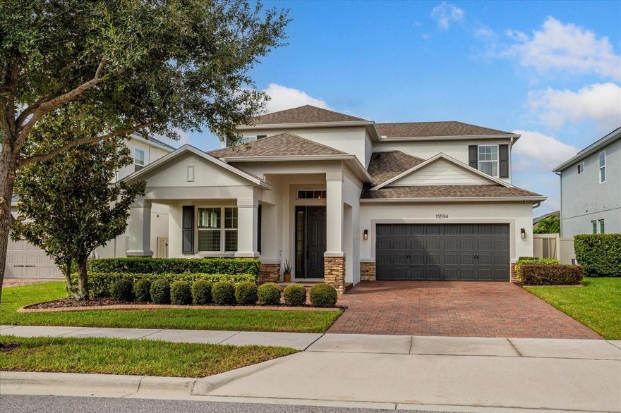 Immaculate 4-bedroom, 2 1/2 bathroom home available for immediate move-in in the highly sought-after, gated community of Hickory Hammock. Situated near John’s Lake, this home offers convenient access to the community dock, clubhouse, gym, swimming pool, tennis courts, and park.

The home’s floor plan is the popular “Dorchester” model by MI Homes. It features a downstairs primary suite, an island kitchen open to the family room, and an upstairs bonus room. Notable finishing touches include ceramic tile floors throughout the downstairs and upstairs areas, granite countertops, stainless steel appliances, under-cabinet lighting, plantation shutters, and a shiplap accent wall.

Enjoy the spacious turfed backyard with your family and friends, where you can grill or relax by the fire pit. The home is conveniently located near shopping, restaurants, major roads, and the Winter Garden Village.

Schedule a viewing today to experience this beautiful and immaculate home.