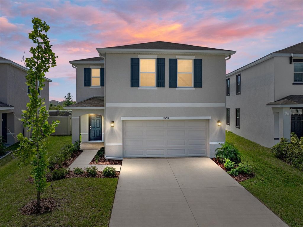 Photo of 30739 Penny Surf Loop, Wesley Chapel, FL 33545 (MLS # TB8373988)