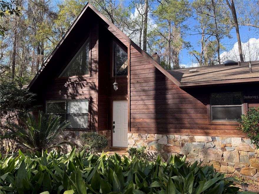 Under contract-accepting backup offers. Nestled in the desirable Emerald Woods community, this inviting home sits on a large, wooded lot surrounded by mature trees and natural beauty. The setting offers a peaceful, natural backdrop while remaining conveniently located just minutes from I-75, making commuting and access to shopping, dining, and everyday amenities simple and convenient.
Inside, the home immediately impresses with soaring vaulted ceilings that create an open, airy feel throughout the main living space. Anchoring the room is a dramatic two story stone fireplace, a striking architectural feature that extends to the ceiling and adds warmth, character, and visual impact to the living area.
Overlooking the living room is a versatile loft, providing additional flexible space that works beautifully as a home office, reading lounge, creative studio, or secondary living area.
The home features a thoughtfully designed split bedroom floor plan that balances comfort and functionality. The primary suite is positioned on one side of the home and offers a spacious retreat with dual walk in closets, providing generous storage. The remodeled primary bathroom has been tastefully updated with modern finishes that create a fresh and relaxing atmosphere.
On the opposite side of the home, two additional bedrooms and a full bathroom provide comfortable space for family, guests, or workspace needs.
The remodeled kitchen blends style and practicality, featuring updated finishes, ample cabinetry, and a well designed layout that offers both functionality and comfort. Thoughtfully updated, this space provides an inviting setting for cooking and meal preparation while remaining conveniently located near the dining and living areas.
Throughout the home you will find no carpet, contributing to a clean, modern aesthetic while also offering easy maintenance.
Outdoor living is just as enjoyable with a spacious deck overlooking the wooded backyard, an ideal spot for morning coffee, outdoor dining, or gathering with friends while enjoying the natural surroundings.
With its architectural character, thoughtful updates, beautiful wooded setting, and location in Emerald Woods near I-75, this home offers a wonderful combination of comfort, convenience, and charm.