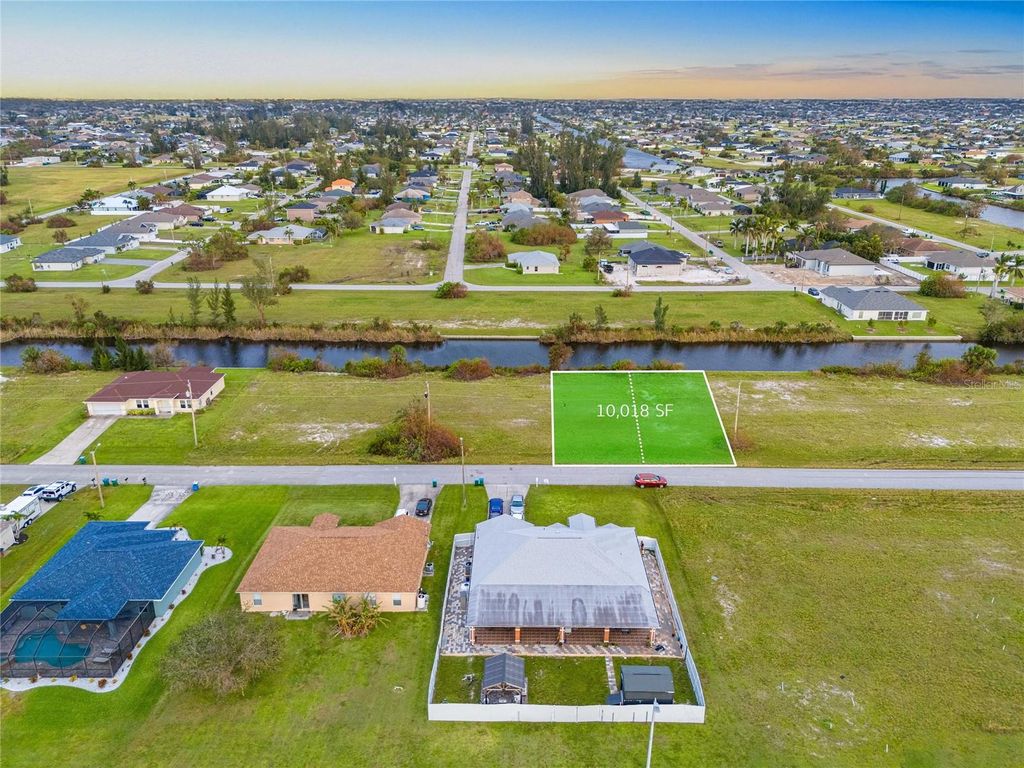 Photo of 1009 NW 31 Street, Cape Coral, FL 33993 (MLS # O6309718)