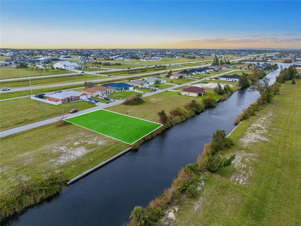 Photo of 1009 NW 31 Street, Cape Coral, FL 33993 (MLS # O6309718)