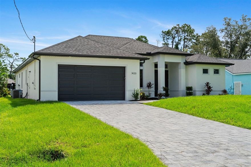 Move-in-ready  New Construction premium home,   Motivated seller looking to sell last 3 properties as a package deal..  Boasting a French-door entry den big enough to be used as a bedroom, three (3) bedrooms, two (2) bathrooms, full size laundry room, and more are waiting for you to call it your very own slice of Florida sunshine.   All quartz countertops in wet areas, soft-close cabinetry, hurricane-impact windows and doors, expanded halls, trayed ceilings, GE profile appliance package, dual closet-sink-shower in master rooms.  Some additional considerations on this home include a recessed A/C unit to add even more space in the expansive garage, an extended driveway for additional parking space. This home is located in a NO FLOOD ZONE, so no premium is necessary AVINGS and SAFETY for you!  Come schedule a private viewing to see your Florida dream home and life, become your reality.