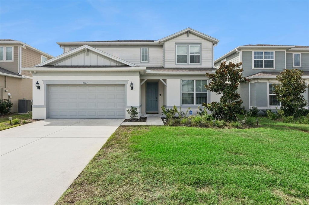 Photo of 5664 Oak Knoll Drive, Saint Cloud, FL 34771 (MLS # O6444153)