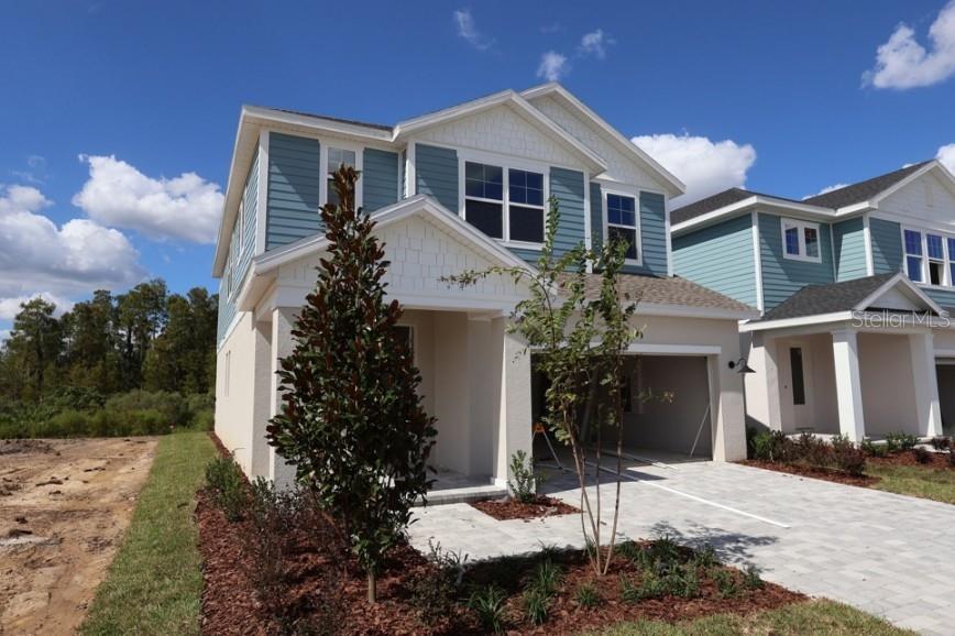 Photo of 3483 Yellow Cassia Drive, Wesley Chapel, FL 33543 (MLS # TB8562819)