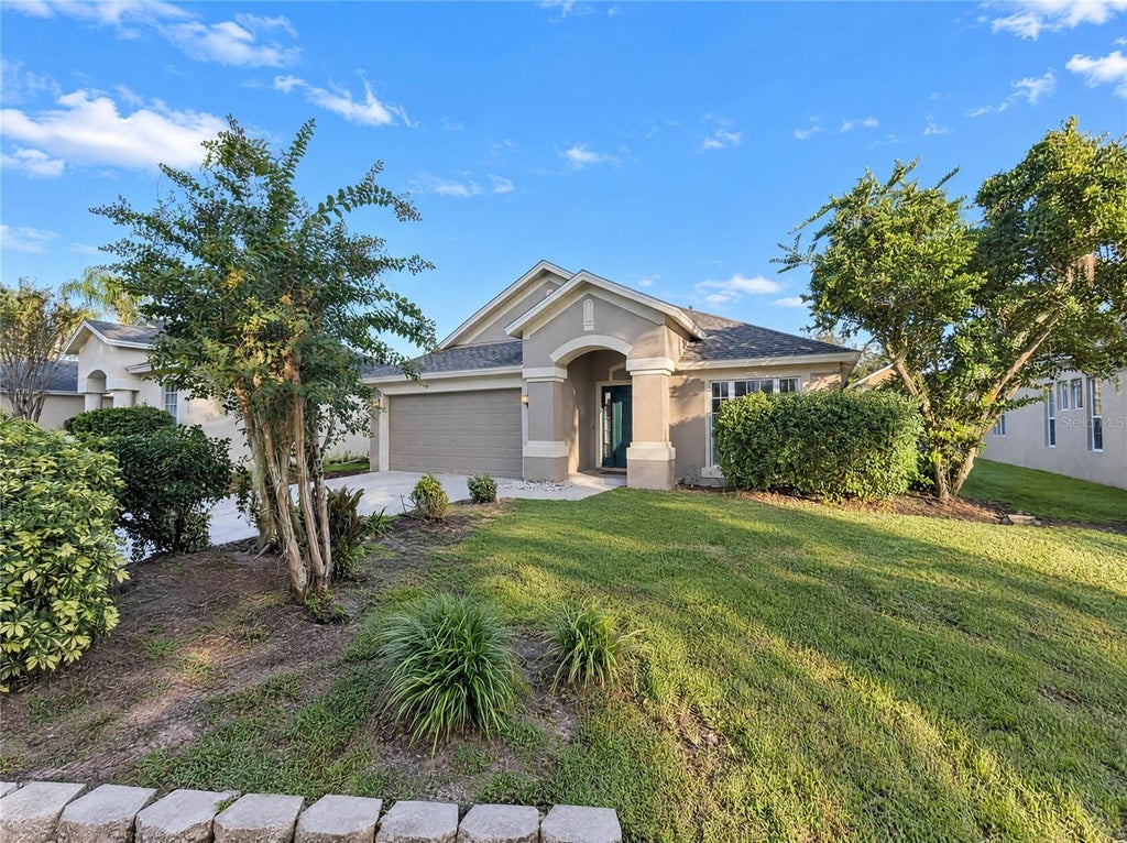 Photo of 30447 Iverson Drive, Wesley Chapel, FL 33543 (MLS # O6452278)