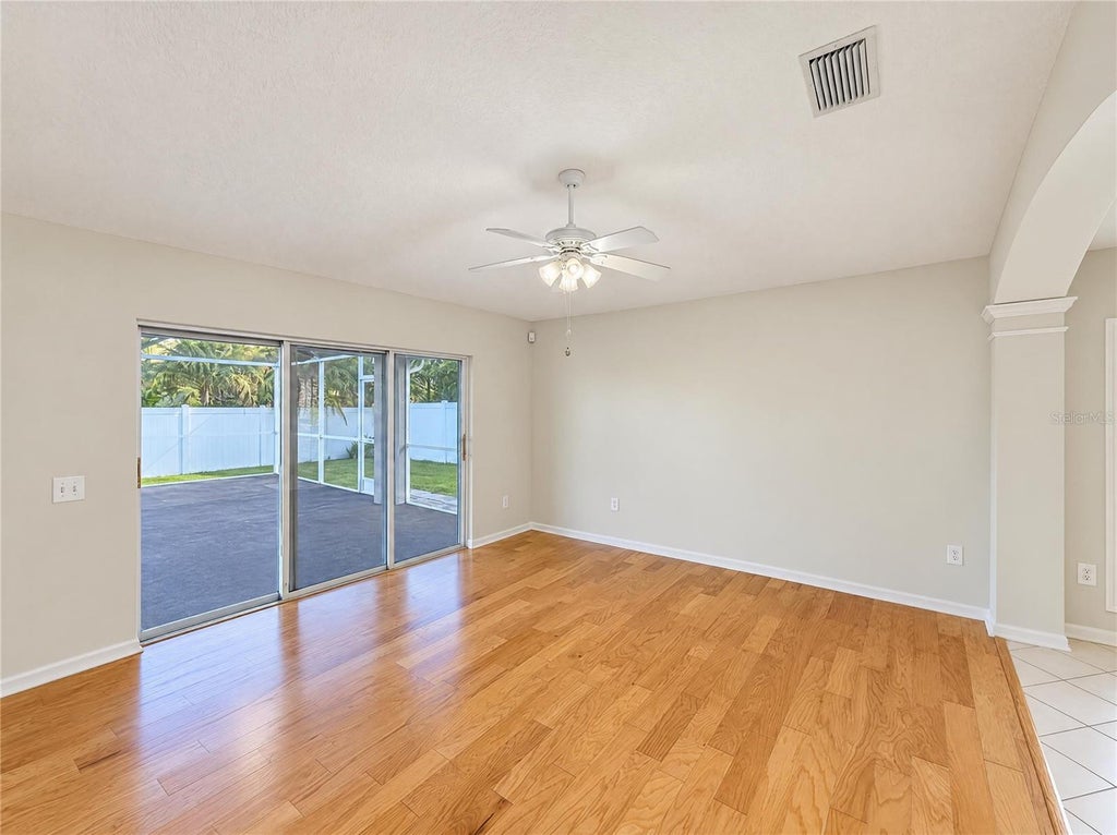 Photo of 30447 Iverson Drive, Wesley Chapel, FL 33543 (MLS # O6452278)
