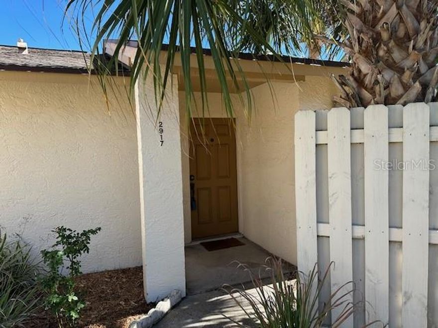 Nestled in the desirable Morningside neighborhood, this rarely available one-bedroom end-unit condo presents a private retreat in an ideal location just minutes from Bradenton’s stunning beaches, GT Bray Park’s 140+ acres of recreation, and convenient access to transit, shopping, and dining. Vaulted ceilings create an airy, light-filled living space accented by attractive plantation shutters and a sliding door that opens to a peaceful patio overlooking a greenbelt — perfect for relaxing. A thoughtfully designed kitchen features a second sliding door that leads to a charming front garden patio. The spacious primary bedroom includes a large walk-in closet and en-suite bathroom, and assigned parking directly in front of the home — with ample guest spaces nearby — completes this comfortable and well-located coastal haven.  HOA dues include cable, water, sewer, trash, exterior maintenance and grounds maintenance.