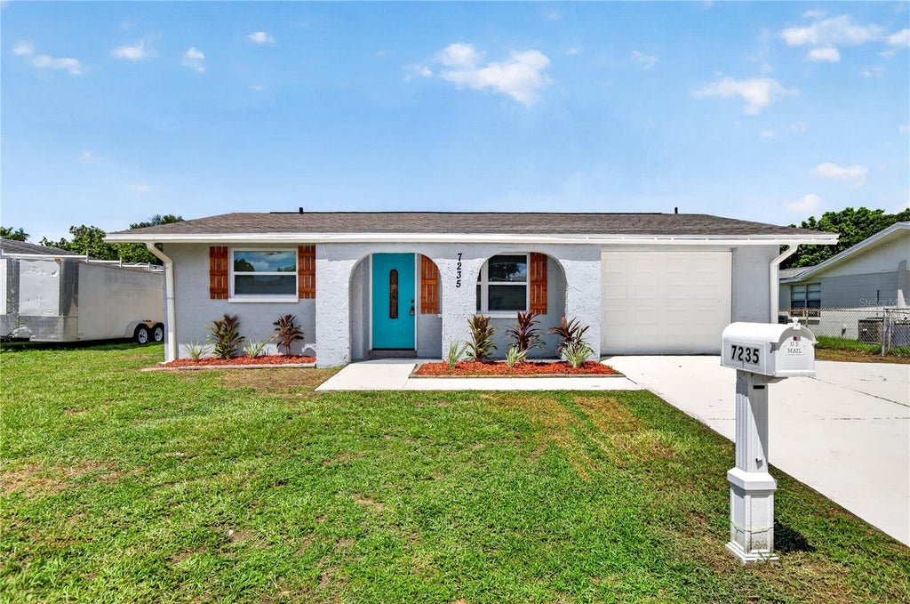Photo of 7235 Robstown Drive, Port Richey, FL 34668 (MLS # W7889252)