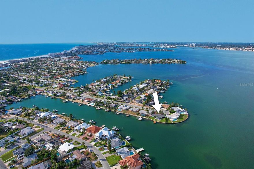 Welcome to 485 41st Ave, a waterfront haven nestled in the heart of St Pete Beach, FL. This updated 2012 sq ft single level home boasts 3 generously sized bedrooms and 3 bathrooms, offering ample space wrapped in serene comfort. This home is high and dry and therefore had no impairment during the 2024 hurricane season. 

Wake up to breathtaking sunrises and wind down your evenings with stunning sunsets; this prime location affords quick access to the Gulf waters from your very own private dock. Enjoy 111 feet of unobstructed water frontage. The open concept living space, coupled with a chef's kitchen inclusive of a large island, guarantees a view of the tranquil Boca Ciega Bay from every angle.

Step into the Water-view Primary Suite that oozes luxury, a large walk-in closet, dual vanity, and a spacious walk-in shower. Beyond the living quarters, the home offers a large Florida room perfect for soaking in the serene surroundings and an expansive deck overlooking the bay - envision endless evenings spent basking in the glow of a setting sun.

Reliable with a newer roof and A/C, this home provides peace of mind among its many other amenities. This waterfront ranch home is an incredible find if you're seeking prime location, space, and unforgettable views.

Located only minutes from St pete Beach's world renowned pristine sandy beaches, dining, shopping and entertainment.

Don't miss the opportunity to step into this slice of paradise! For more details or to schedule a personalized tour, feel free to contact us at your earliest convenience. The luxury of a waterfront life awaits!