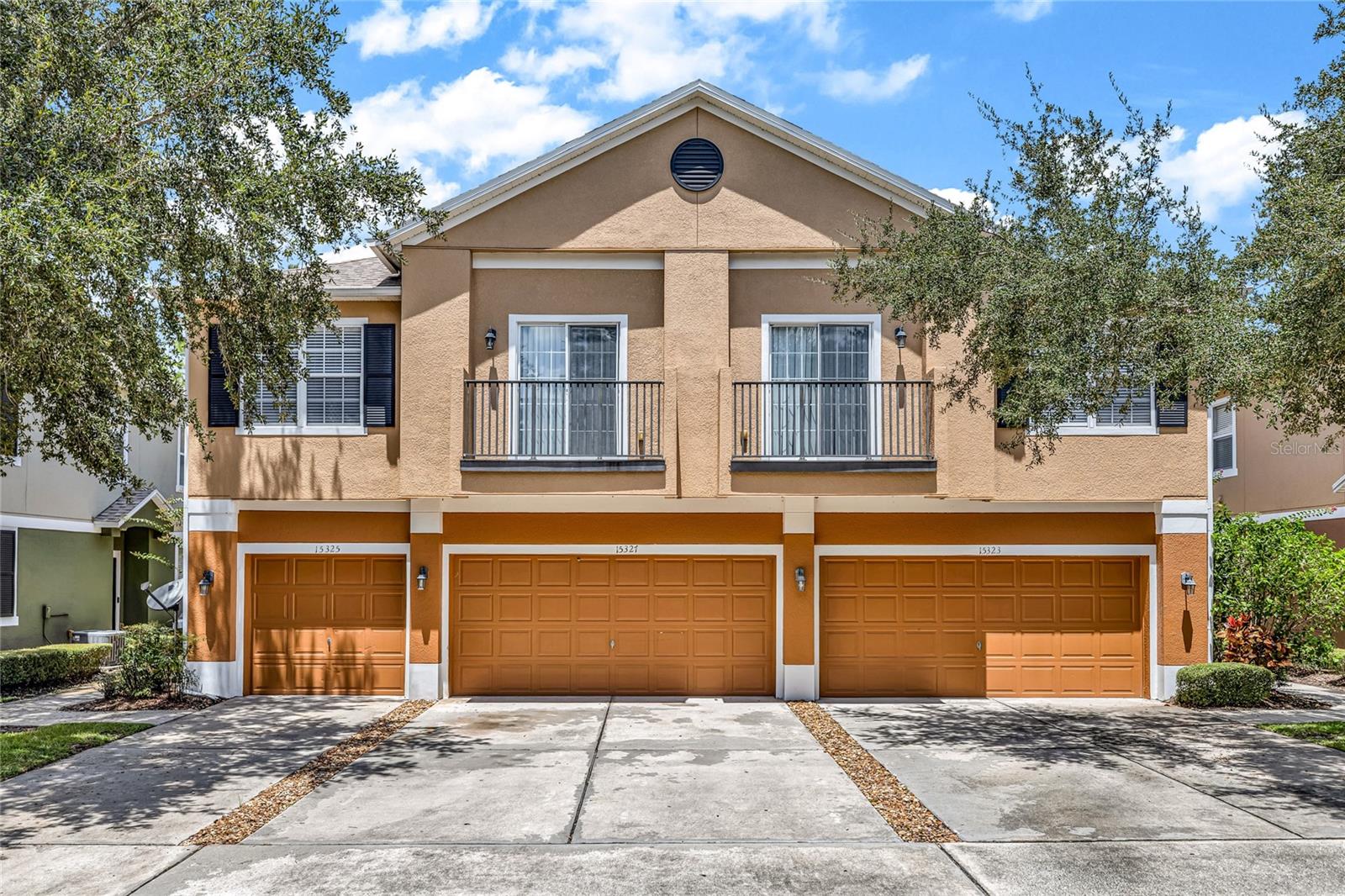 Gorgeous, move-in ready, 2/2 townhome inside gated community of Tucker Oaks! This second floor unit has just been refreshed with new paint and carpets throughout. It offers an open space kitchen/dining/family room combo perfect for entertaining. Spacious kitchen with updated cabinets and appliances, will be suitable for anyone that loves to cook! Dual masters in a split floorplan with spacious rooms and large closets, and includes a 1-car garage! Low monthly HOA! Tucker Oaks community offers a pool, walking paths, basketball courts, BBQ area, playground, and pet park, all conveniently located near Winter Garden Village, with easy access to Hwy 50, Florida's Turnpike, and the 429! Whether you plan to move in or use it for an investment property, you don’t want to miss out on this gem!