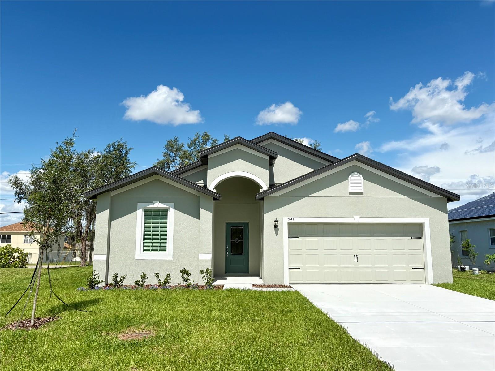 Discover the perfect blend of comfort, style, and affordability with the Escambia floor plan by LGI Homes. This beautifully designed single-story home offers a spacious open-concept layout that’s ideal for both everyday living and entertaining. The heart of the home is a chef-ready kitchen that includes granite countertops, energy-efficient Whirlpool® appliances, and elegant wood cabinets. The large family room flows seamlessly into the covered patio, making it easy to enjoy indoor-outdoor living year-round. This home features four spacious bedrooms, including a private owner’s suite complete with a dual-sink vanity, a large walk-in closet, and an en-suite bathroom. A versatile flex room and abundant storage throughout the home provides additional space to meet your family’s changing needs. The Escambia also includes a two-car garage and a beautifully designed master retreat to serve as your personal sanctuary. Located in a community rich with amenities, residents will enjoy access to a baseball field, basketball court, playground, dog park, picnic area, soccer fields, swimming pools, a volleyball court, and more, along with proximity to nearby dining and shopping. LGI Homes makes the path to homeownership easier with low to no down payment options, builder-paid closing costs, thousands in included upgrades, quick move-in opportunities, and a structural warranty for peace of mind. The Escambia floor plan truly offers everything you need, and more, to start your next chapter.