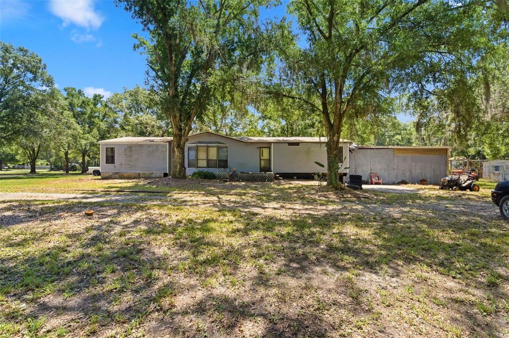 Photo of 1136 Wildwood Lane, Lutz, FL 33558 (MLS # TB8516706)