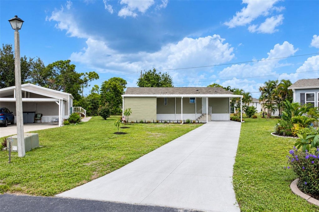 Photo of 9066 Pinehaven Way, Englewood, FL 34224 (MLS # D6149093)
