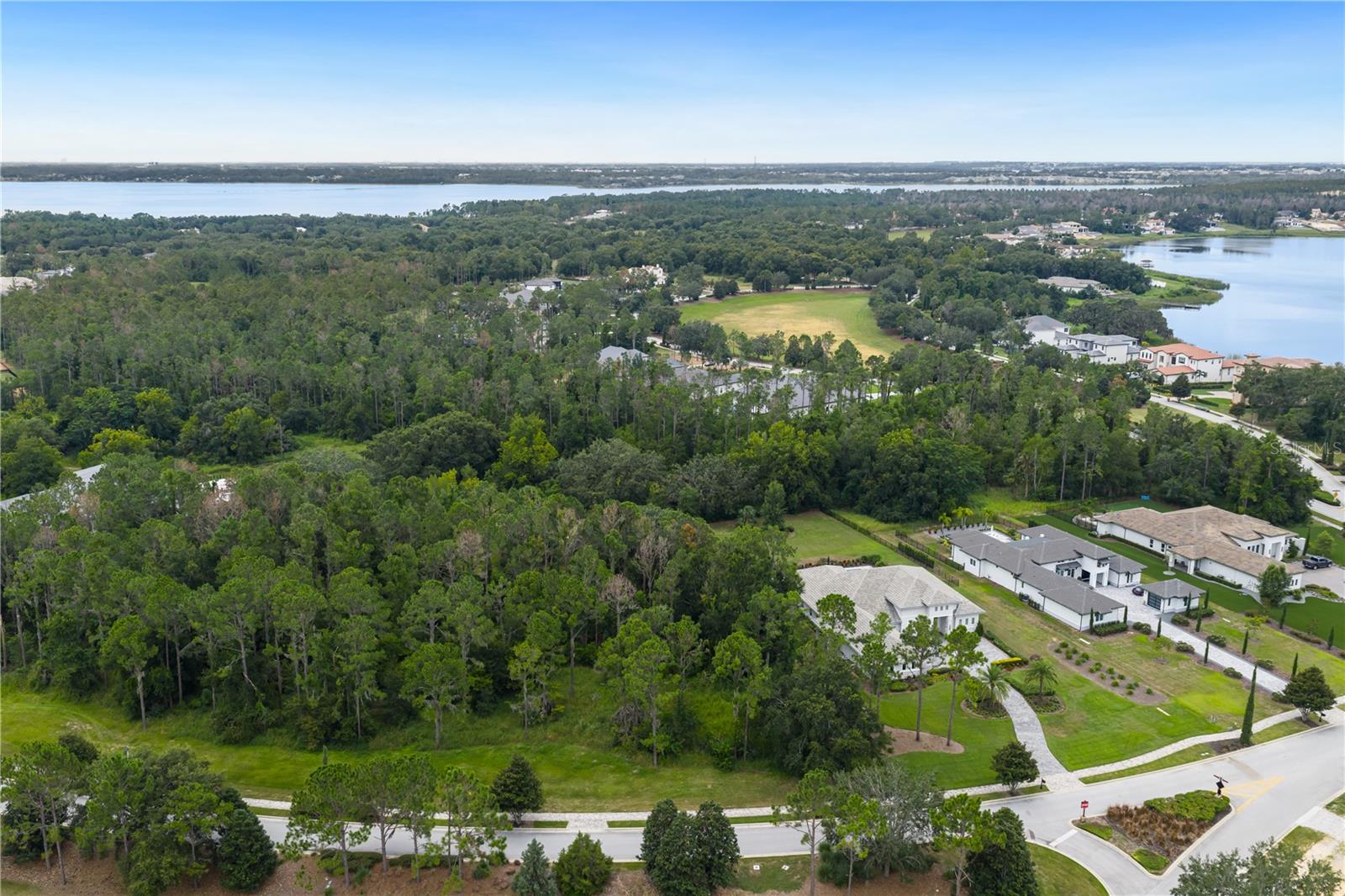 Build your forever home on this wooded preserve homesite in the highly sought after gated community of Bella Collina. Offering a South facing backyard, design your home and backyard oasis with the flexibility of selecting from 6 fully custom builders with no time frame to start construction. Just minutes from Monteverde Academy, downtown Winter Garden and the West Orange bike and walking trails. The Club at Bella Collina with its incredible views offers Har-Tru tennis courts, pickleball, outdoor pool complex, fitness center with 20 complimentary weekly classes, spa and multiple dining venues. Meet new neighbors while you enjoy the year-round social and culinary event’s or play a round of golf on our 18 hole Championship golf course designed by Nick Faldo. This homesite also offers the opportunity for a double lot purchase with the adjacent site and includes the $40,000 Sports membership Deposit from the Developer. Call today to preview this opportunity and learn all about Bella Collina.