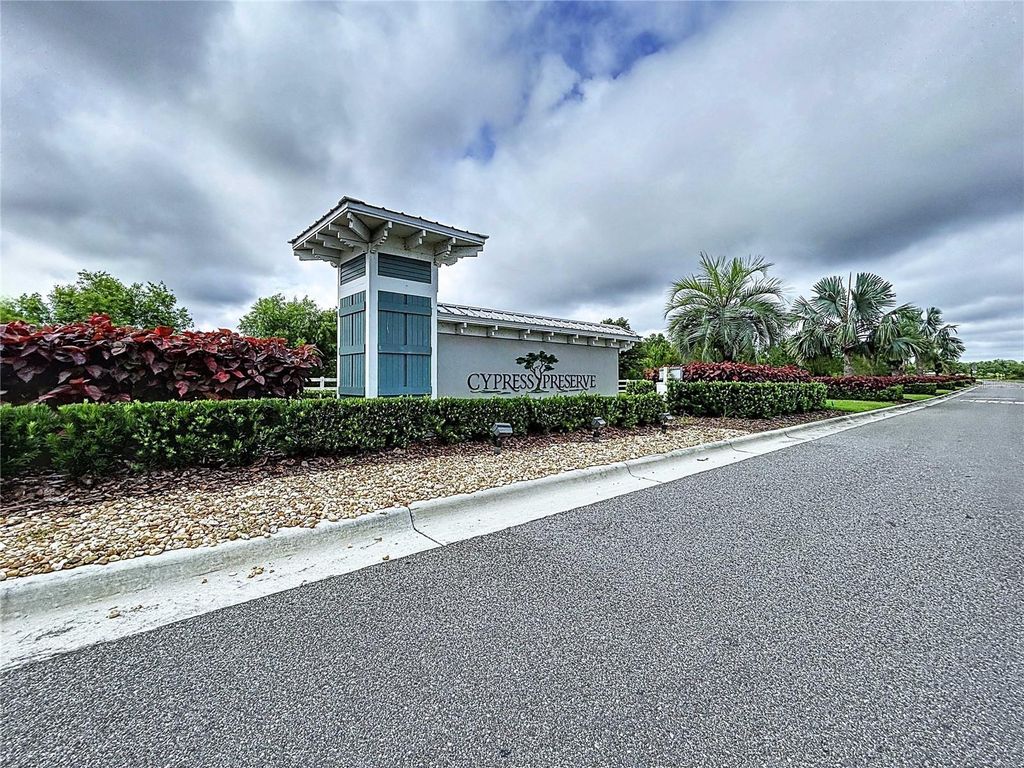 Photo of 10347 Heron Hideaway Loop, Land O Lakes, FL 34638 (MLS # TB8393548)