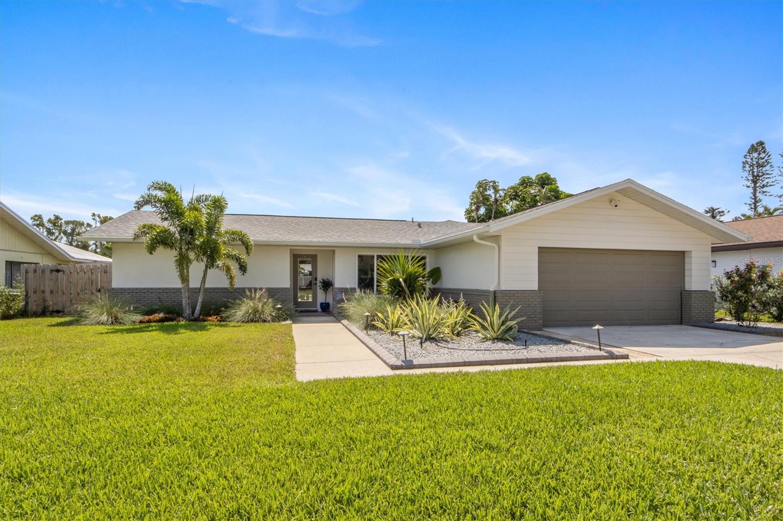 COASTAL POOL HOME NEAR ANNA MARIA – UPDATED & MOVE-IN READY
Welcome to your slice of paradise in PALMA SOLA VILLAGE—just minutes from the beaches of ANNA MARIA ISLAND! This beautifully updated 3-BEDROOM, 2-BATH home sits on a generous 10,000+ SQ FT LOT and features a PRIVATE POOL, OPEN-CONCEPT LAYOUT, HIGH CEILINGS, and a SPLIT FLOOR PLAN that offers both comfort and privacy.
Contemporary POLISHED CONCRETE FLOORS flow through the main living areas, while the bedrooms feature LUXURY VINYL PLANK FLOORING for added warmth and durability.
Inside, you'll find thoughtful upgrades throughout: IMPACT WINDOWS AND DOORS (2021), RE-PIPED PLUMBING (2018), and a REBUILT CHIMNEY EXTERIOR (2018). The front of the home was refreshed with NEW HARDIE BOARD SIDING AND STUCCO (2021), along with NEW SOFFITS, INTERIOR DOORS, AND TRIM (2022).
Additional features include a REMODELED PRIMARY BATHROOM, UPDATED LAUNDRY ROOM, and a 2022 EXTERIOR CAMERA SYSTEM. The A/C SYSTEM has been enhanced with UV LIGHT, REBUILT PLENUM, AND CLEANED DUCTWORK (2025) for comfort and efficiency.
Out back, enjoy your PRIVATE OASIS with a REBUILT POOL MOTOR (2024), NEW FILTER (2023), SALT CELL (2023), plus a NEW FENCE, GATES, and PROFESSIONALLY LANDSCAPED FRONT YARD WITH IRRIGATION (2024).
With its RELAXED COASTAL STYLE, FUNCTIONAL LAYOUT, and UNBEATABLE LOCATION CLOSE TO THE ISLAND, this home is ready to enjoy from day one.