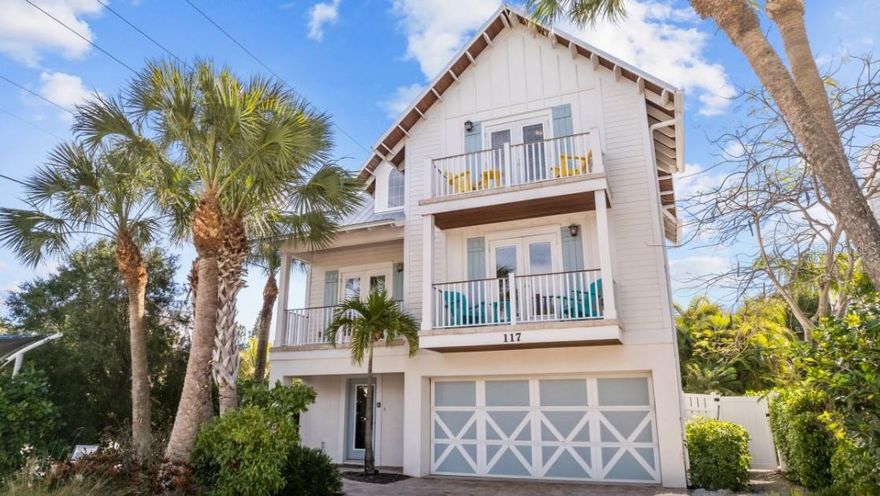 Exceptional island retreat located on beautiful Anna Maria Island, just one block from the beach and a short stroll to the charming shops and restaurants along Pine Avenue. This custom-built 2,000 sq. ft. home offers the perfect blend of coastal luxury and investment potential. Designed with an open-concept floor plan, the residence features 5 bedrooms, 3 1/2 baths, providing ample space for family and guests. The newly remodeled kitchen showcases high-end finishes and flows seamlessly into the main living areas, ideal for entertaining. Step outside to your private resort-style oasis featuring a luxury heated pool and spa with generous poolside seating, perfect for relaxing after a day at the beach. Additional highlights include a dedicated game room and a rooftop deck offering the perfect space to enjoy island sunsets and coastal breezes. Whether you are seeking a private second home or a strong income-producing investment property, this home delivers. With weekly rentals allowed, a 12-person occupancy, and a proven rental history, it offers excellent income potential. Being sold turnkey, this island property is ready for immediate enjoyment or continued rental success.