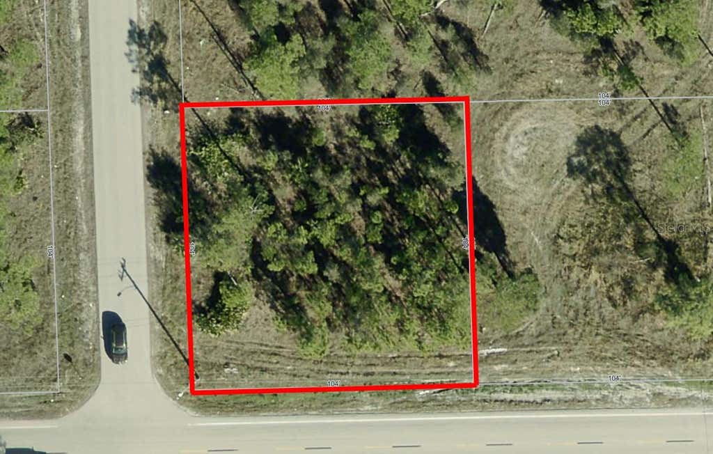 Photo of 2101 E 10th Street, Lehigh Acres, FL 33936 (MLS # TB8537850)