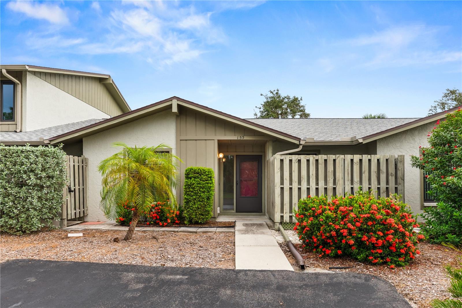 Discover this hidden gem 2-bedroom, 2-bathroom first-floor condo in the desirable 55+ waterfront community of Gasparilla Condos in Englewood. CLICK ON THE VIRTUAL TOUR LINK 1 FOR THE VIDEO AND VIRTUAL LINK 2 FOR THE 3D TOUR. This updated condo offers a bright open floor plan with vaulted and tray ceilings and luxury vinyl flooring throughout. The kitchen features stainless steel appliances including a double oven, solid surface countertops, farmhouse sink, tiled backsplash, a breakfast bar, and plenty of cabinets for storage, along with a convenient laundry closet. The master suite provides a peaceful retreat with dual closets, private access to the screened lanai, and an en-suite bath with a walk-in shower and single sink vanity. The guest bedroom offers a built-in closet and nearby bath with a tub/shower combo. Step out to the screened lanai, a serene space surrounded by lush landscaping—perfect for enjoying morning coffee or evening relaxation. Gasparilla Condominiums is a charming 55+ waterfront community situated on Gottfried Creek. Residents enjoy a relaxed coastal lifestyle with access to a clubhouse, community pool, and shuffleboard courts. For those who love the water, kayak storage and community docks are available on a first-come, first-served basis for an additional fee. Perfectly located just minutes from local dining, live entertainment, shopping, golf, and the pristine Gulf beaches, Gasparilla Condos offers the best of Florida living in a welcoming and active community. Schedule your showing TODAY!