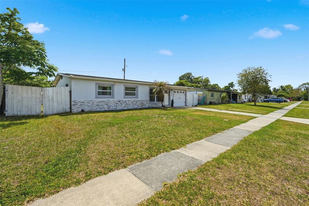 Photo of 5922 Malcross Drive, Orlando, FL 32812 (MLS # O6401545)