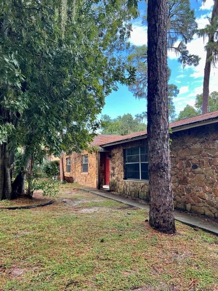 Discover the charm of this exquisite corner lot residence! Step inside and experience the allure of this delightful 3-bedroom, 2-bathroom home, nestled in the scenic Riverhills neighborhood, just a stone's throw away from the serene Hillsborough River.
As you enter through the front door, you'll be greeted by a generously sized living room that seamlessly flows into an inviting kitchen and dining area. The entire home boasts new carpeting and has been freshly painted, providing a clean and modern aesthetic.
The three spacious bedrooms are adorned with plush, newer carpeting, ensuring comfort and style throughout. Adjacent to the living spaces, you'll find a remarkably spacious laundry room conveniently located just off the oversized 2-car garage. As an added bonus, all appliances, including the washer and dryer, are included with the home. Step outside onto the large screened lanai or the open patio to savor the beauty of this stunning lot, adorned with meticulous landscaping that adds to the overall allure of the property. This residence offers not only a comfortable living space but also a captivating outdoor retreat that's perfect for relaxation and entertaining. Don't miss the opportunity to make this your forever home!
