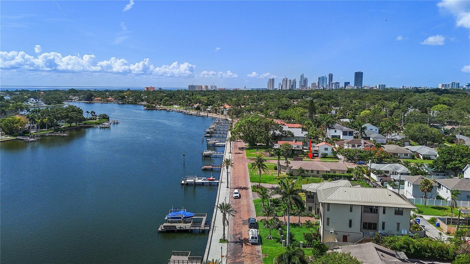 Don't miss this extraordinary opportunity to build your waterfront dream home in highly sought-after Granada Terrace in the Old Northeast. This 69 x 128, .41 acre corner lot offers breathtaking views of the tranquil Coffee Pot Bayou. Best of All, it's priced under recent appraisal. Envision designing your own custom dream home on one of the most desirable streets in St. Petersburg. The property includes a newer 12x12 composite dock built in 2021 with a new gate installed in 2025. Embrace the waterfront living with easy boating access to the waters of Tampa Bay and the Gulf of Mexico. Launch your kayaks and paddle boards from your dock. Enjoy a walk or bike ride along the picturesque Coffee Pot Bayou to the waterfront parks and downtown St. Petersburg. The home experienced flooding from Helene and has not been remediated. The property is being offered AS-IS.