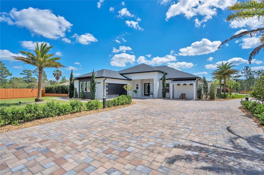 Photo of 19240 Lansdowne Street, Orlando, FL 32833 (MLS # O6425857)