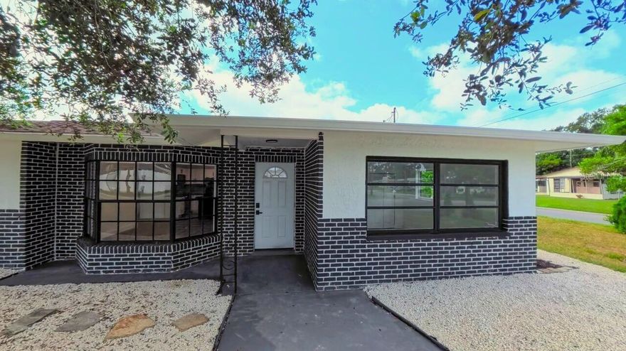 One or more photo(s) has been virtually staged. Welcome to this fully renovated 4-bedroom, 2-bath home with 1,545 sq ft of thoughtfully designed living space. Updated throughout, it features a modern kitchen with new appliances, granite countertops, and custom cabinetry, along with two beautifully remodeled bathrooms. A new roof in 2023 and a fully maintained AC system in 2025 provide lasting value and peace of mind.

Inside, you’ll find a separate laundry room for convenience and a generously sized storage space with private access, perfect for seasonal items, hobbies, or extra household needs.

Outside, enjoy your own private retreat with a sparkling in-ground pool, great for relaxation and entertaining. A large driveway and covered carport provide ample parking. Combining comfort, style, and functionality, this charming Seminole home is ideally located near schools, shopping, and the Gulf beaches.