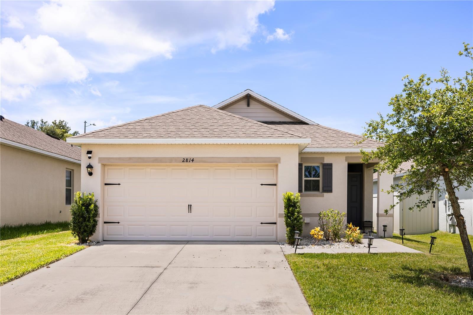 One or more photo(s) has been virtually staged. Welcome to this beautifully maintained 3-bedroom, 2-bath home located in a gated community in desirable Timberlake in Ocoee. Built in 2019, this property combines modern style with everyday comfort.
Step inside to find an open-concept layout with a spacious living and dining area, perfect for entertaining or family gatherings. The kitchen features stainless steel appliances, ample dark brown cabinetry, and a large island that’s ideal for meal prep and casual dining. The owner’s suite offers a walk-in closet and private bath with dual sinks and a glass-enclosed shower.
Enjoy the Florida lifestyle in your private backyard—perfect for BBQs, play, or simply relaxing. The home also includes a two-car garage, energy-efficient windows, and contemporary finishes throughout.
Located just minutes from West Oaks Mall, Publix, Starbucks, the West Orange Trail, and countless dining options, you’ll have everything you need right at your fingertips. Easy access to major highways means a quick commute to downtown Orlando, theme parks, and Orlando International Airport.