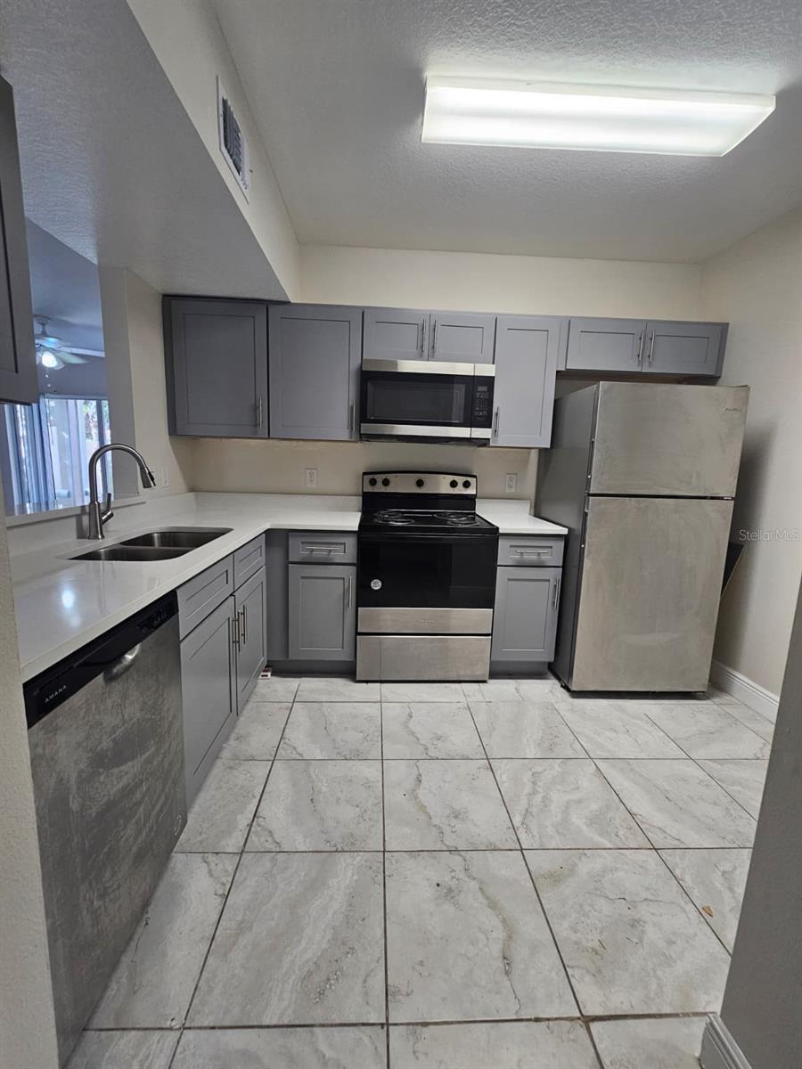 Photo of 13232 Galicia St #101, Orlando, FL 32824 (MLS # S5157074)