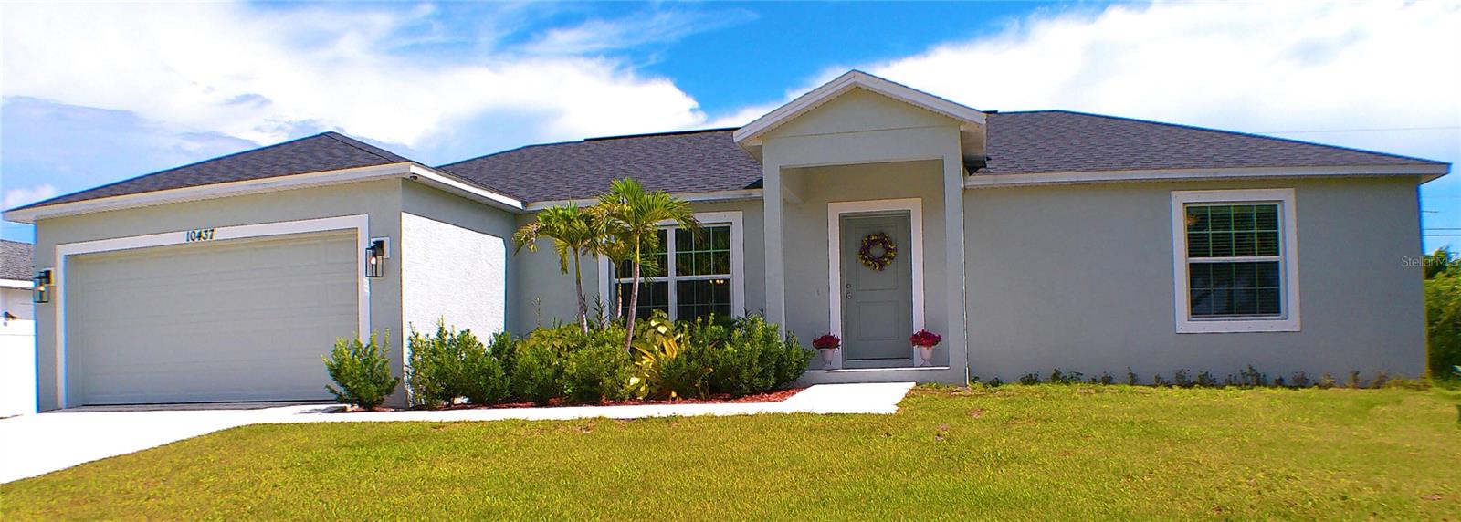 Welcome to coastal living at affordable pricing with No Flood Zone and No HOA fees in Englewood, FL! Only 10 minutes from beautiful gulf beaches, this newer construction has never been occupied and is move in ready. A spacious 3 bedroom, 2 bath has bright ample lighting, vaulted ceilings, open floor plan, plenty of closets, and high quality upgraded finishes. This great value home boasts granite counters, sleek ceramic tile flooring, quality stainless steel appliances, and ceiling fans in every room. Customize the back open patio lanai and huge private yard oasis with a pool addition or any tropical landscape. Fantastically located on a quiet tree lined street near sheriff's office, grocery, dining, and schools, it's a short bike ride to Myakka State Forest Foreseman Trailhead for nature lovers. Have it all from emerald warm oceans to plush trails minutes away for a price to match your dream. See your vision come to reality .