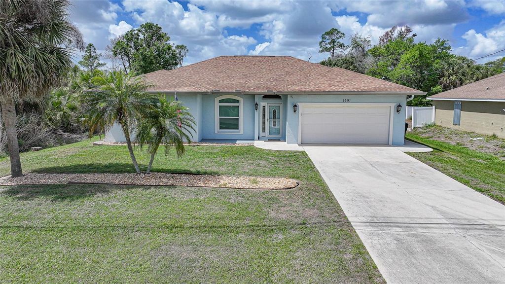 Photo of 1691 S Chamberlain Boulevard, North Port, FL 34286 (MLS # C7524312)