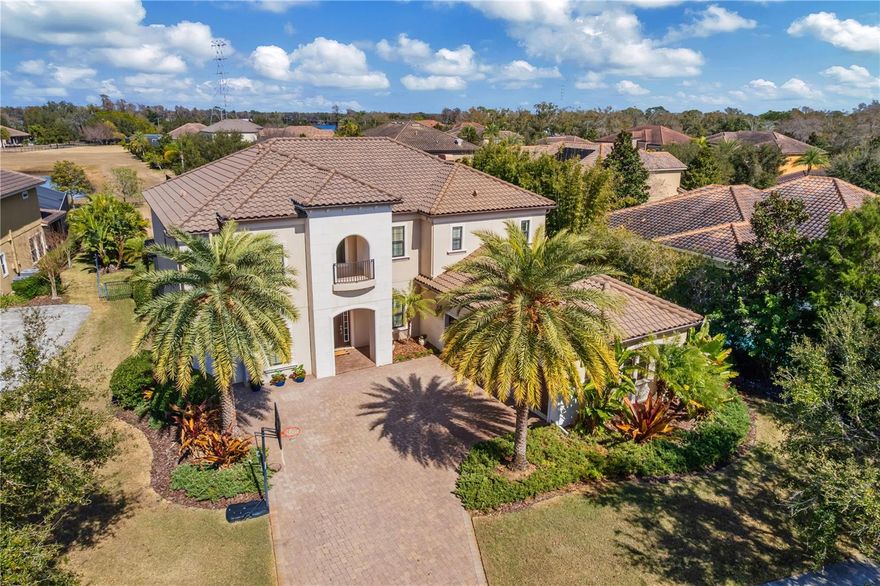 Experience luxury living in sought-after Old Memorial Estates. This inviting, cozy home sits on an expansive lot surrounded by mature landscaping, offering exceptional privacy and curb appeal. Enjoy Florida lifestyle year-round with an enclosed pool and a fully equipped outdoor kitchen, ideal for entertaining. Inside, abundant natural light fills the spacious layout, featuring a loft with new vinyl wood-plank flooring and new plush carpets in the bedrooms. Great space with the primary bedroom and secondary bedroom with en-suite bath on the first floor. The open gourmet kitchen offers plenty of storage, premium finishes, and excellent flow for everyday living and hosting guests. The storage in this home is abundant and will hold everything you need and don't need. Old Memorial Estates is minutes from shopping, restaurants and airport. A quick trip to the beach in your plans, the community is within 20-plus minutes of Honeymoon Island, Clearwater Causeway, Phillippe Park and of course the No. 1 rated beach in Florida, Clearwater Beach.