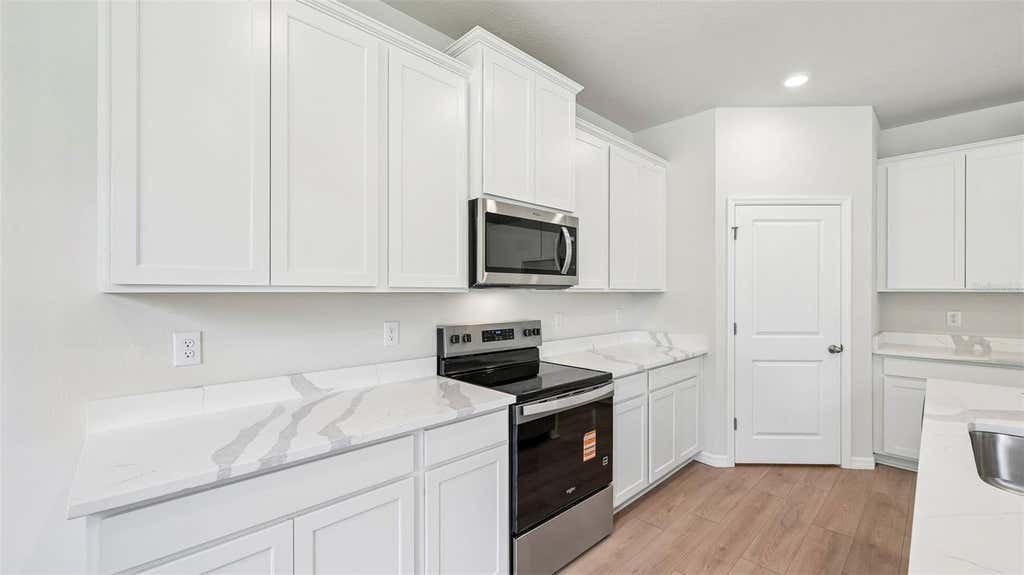 Photo of 10437 Woodland Garden Way, Parrish, FL 34219 (MLS # A4702792)