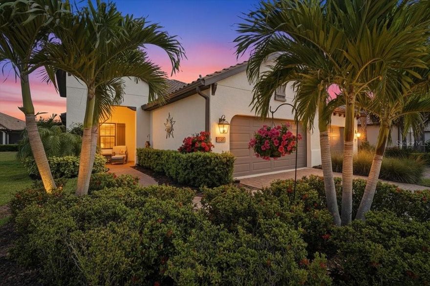 Come experience this spacious Sandcastle model in the highly sought-after community of Boca Royale Golf and Country Club! This three-bedroom villa with a den, features an open floorplan centered around a gourmet kitchen, complete with quartz countertops, upgraded Timberlake pewter glazed cabinets, under cabinet LED lighting, stainless steel appliances, tile backsplash, and a large center island perfect for entertaining. The great room showcases a coffer ceiling and pocket sliding impact glass door, accented by a custom made accordion shade creating a seamless indoor-outdoor living experience. Step onto the extended screened lanai, where tranquil pond views provide the perfect backdrop for dining and relaxation. A gas line rough-in is in place, providing a convenient option for outdoor grilling. This home offers peace of mind with full hurricane protection, including impact windows throughout and Storm Smart screens enclosing the lanai. A retractable front door screen allows a refreshing breeze to flow throughout the home, enhancing comfort while keeping insects out. Upgraded tile flooring extends throughout the home, while the split-bedroom layout ensures privacy for both owners and guests. The spacious primary suite features an ensuite bath and dual vanities, a walk-in glass enclosed shower and over-sized walk-in closet. The versatile office/den can easily function as a fourth bedroom and is conveniently located near a full bath with walk-in shower. Additional highlights include a well-appointed laundry room with built-in cabinetry; two-car garage with utility sink, epoxy floor, and ample storage; and gas appliances (range, water heater, dryer.) Just steps away, residents can enjoy the Belize community pool and hot tub. Boca Royale Golf & Country Club offers a wide range of amenities, including a renovated clubhouse, fitness center, optional golf, tennis and pickleball. Ideally located just minutes from Gulf of America beaches, historic Dearborn Street, downtown Venice, Wellen Park and local farmers’ markets and festivals – this home presents an exceptional opportunity to enjoy the best of Florida living.