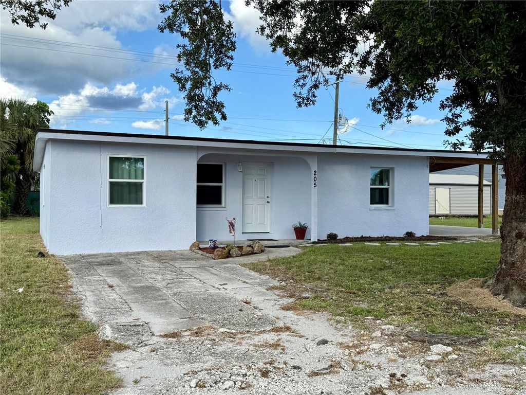 Photo of 205 NE Martin Drive NE, Port Charlotte, FL 33952 (MLS # A4666719)