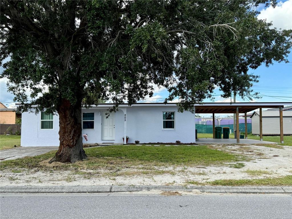 Photo of 205 NE Martin Drive NE, Port Charlotte, FL 33952 (MLS # A4666719)