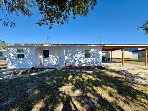 Photo of 205 NE Martin Drive NE, Port Charlotte, FL 33952 (MLS # A4666719)