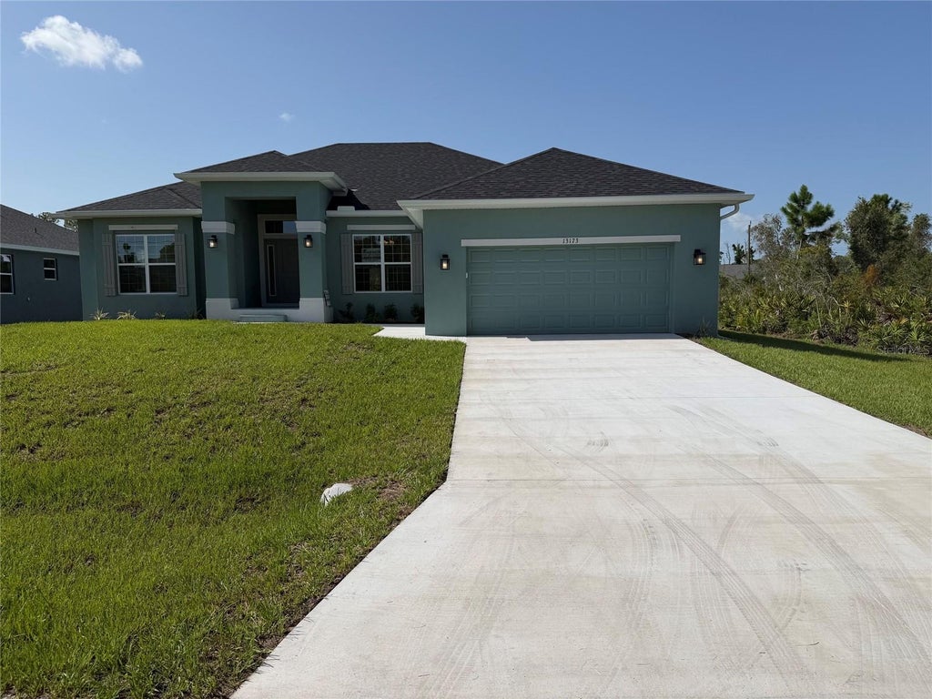 Photo of 13173 Feldspar Avenue, Port Charlotte, FL 33981 (MLS # C7529275)