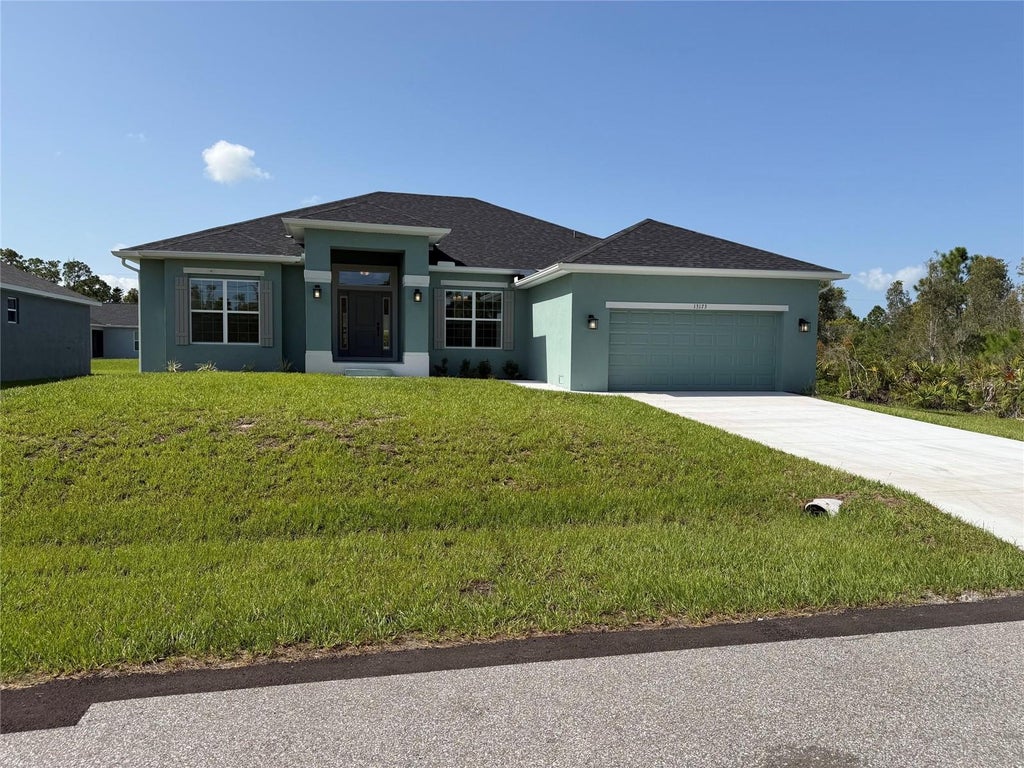 Photo of 13173 Feldspar Avenue, Port Charlotte, FL 33981 (MLS # C7529275)