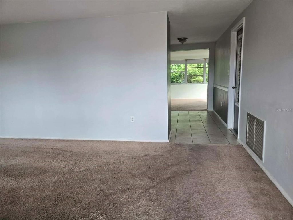 Photo of 5605 Dolores Dr, Holiday, FL 34690 (MLS # TB8486378)