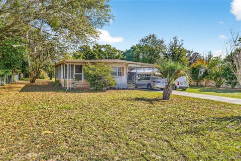 Photo of 5548 Bruce Lane, Wesley Chapel, FL 33543 (MLS # TB8459244)