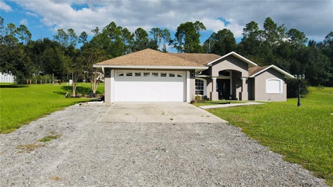 Photo of 8750 Teacher Lane, Zephyrhills, FL 33541 (MLS # TB8558275)