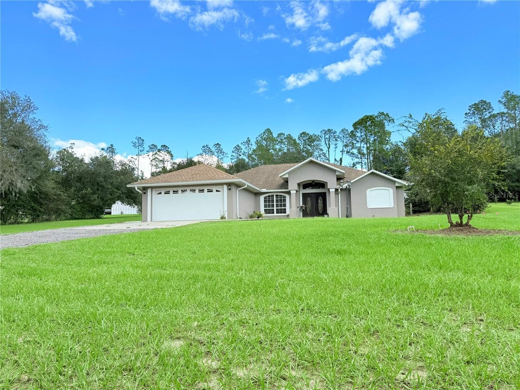 Photo of 8750 Teacher Lane, Zephyrhills, FL 33541 (MLS # TB8558275)