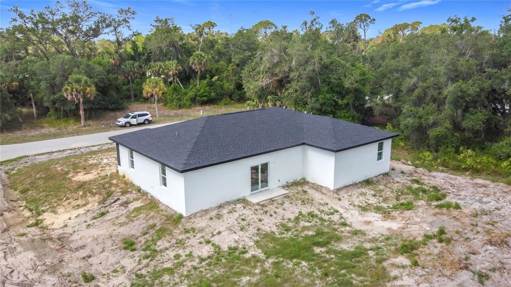 Photo of 16134 Libourn Avenue, Port Charlotte, FL 33954 (MLS # TB8389013)