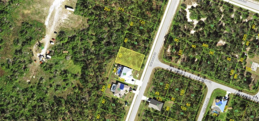 Photo of 9387 Hallendale Drive, Port Charlotte, FL 33981 (MLS # A4641732)