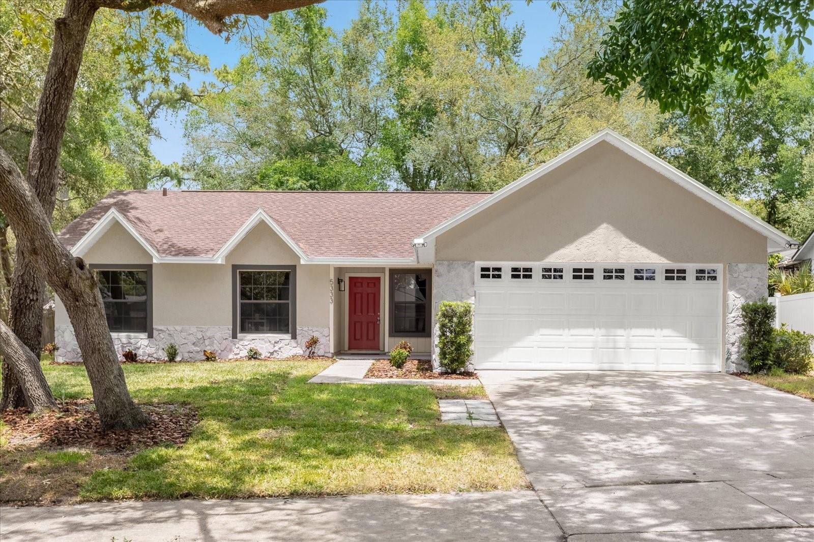 BACK ON THE MARKET!! This beautifully renovated 3 bedroom 2 bathroom home with a huge yard is a MUST-SEE! As you step into the home, you're welcomed by the bright and airy kitchen/living/dining combination you're guaranteed to appreciate. The newly renovated kitchen features granite countertops, shaker-style cabinets, a breakfast bar, and brand-new stainless steel appliances. This split floorplan home provides a private master retreat with a large walk-in closet and a spacious, freshly updated en-suite. Off the living area, you'll find a large den/office space or a potential 4TH BEDROOM. This home also features brand-new, easy-to-maintain Luxury Vinyl Plank flooring, with new carpeting in two bedrooms. The backyard is perfect for entertaining, featuring a large screened-in patio, which can be accessed via the living area and the master bedroom. This home is conveniently located just minutes from dining, shopping, and entertainment. If you're in the market for an affordable, beautiful home with room to grow, this home may be the PERFECT FIT and won't last long. A new hot water heater and new electrical panel were installed May 2023.