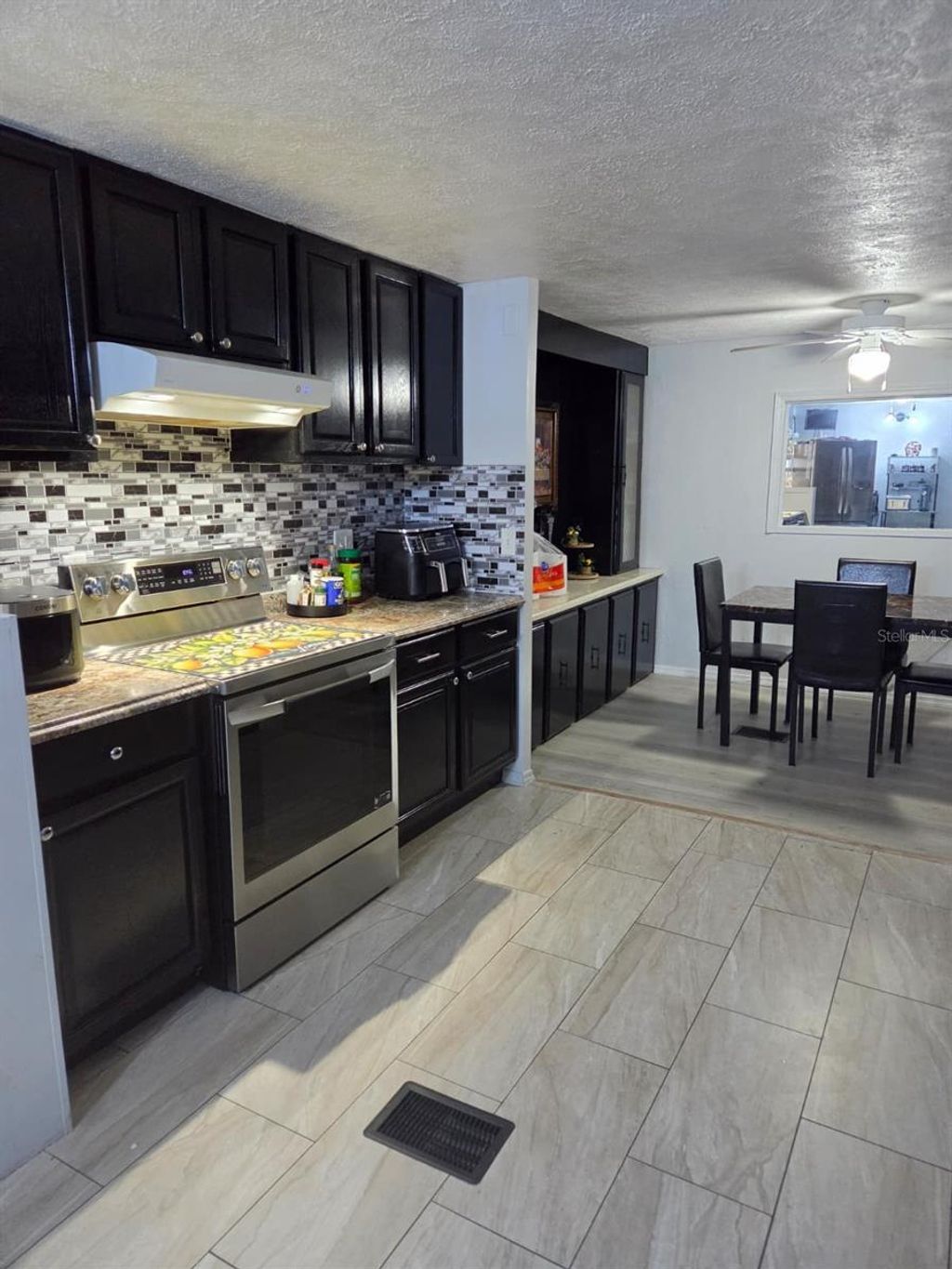 Photo of 6663 Pompeii Road, Orlando, FL 32822 (MLS # O6400177)